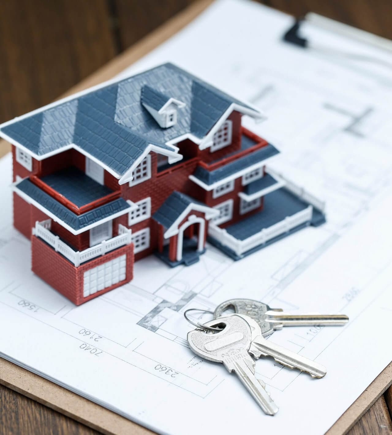 villa-house-model-key-drawing-retro-desktop-real-estate-sale-concept-1-min (1)